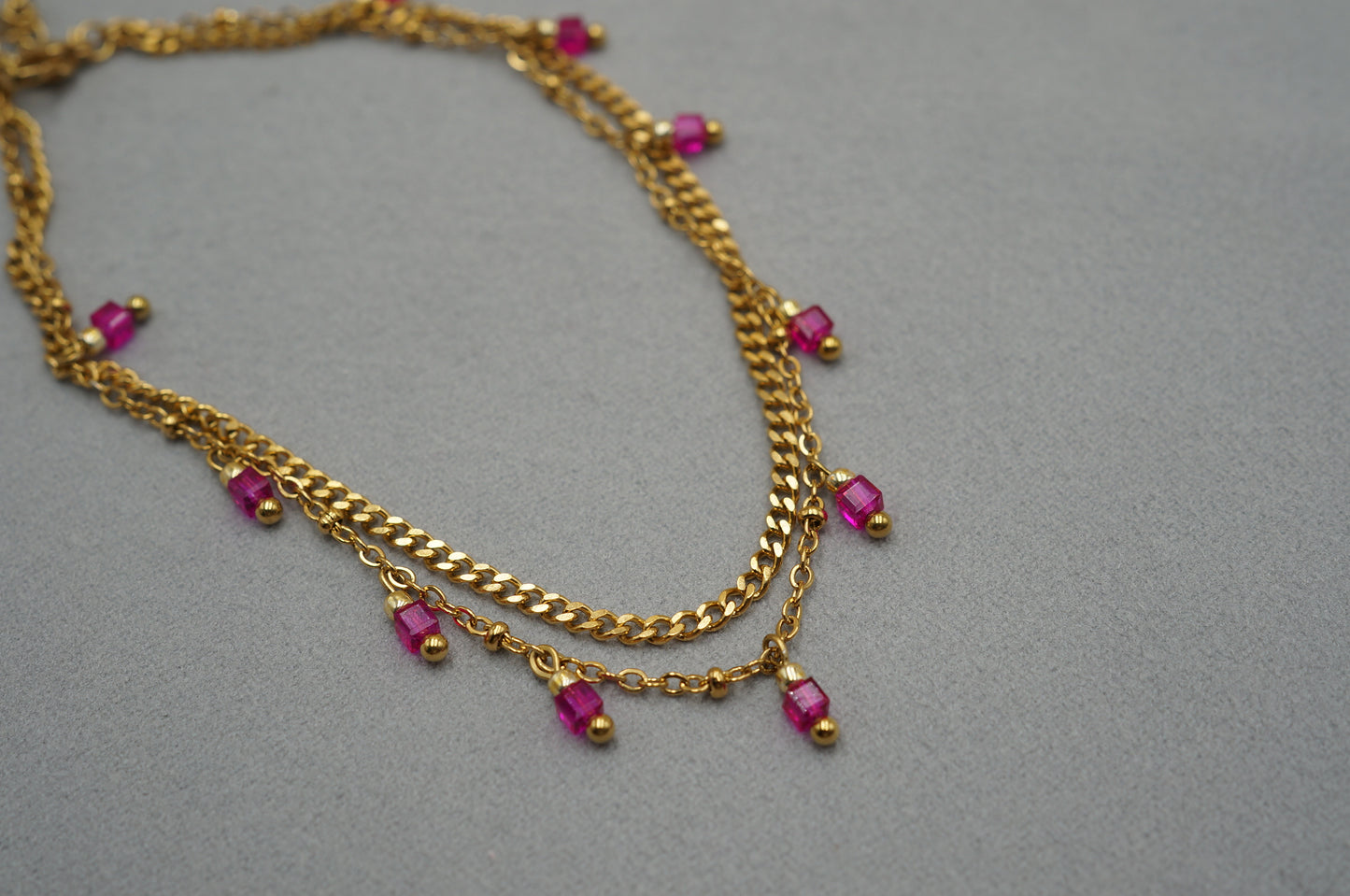 cavigliera a doppio filo con perline pendente