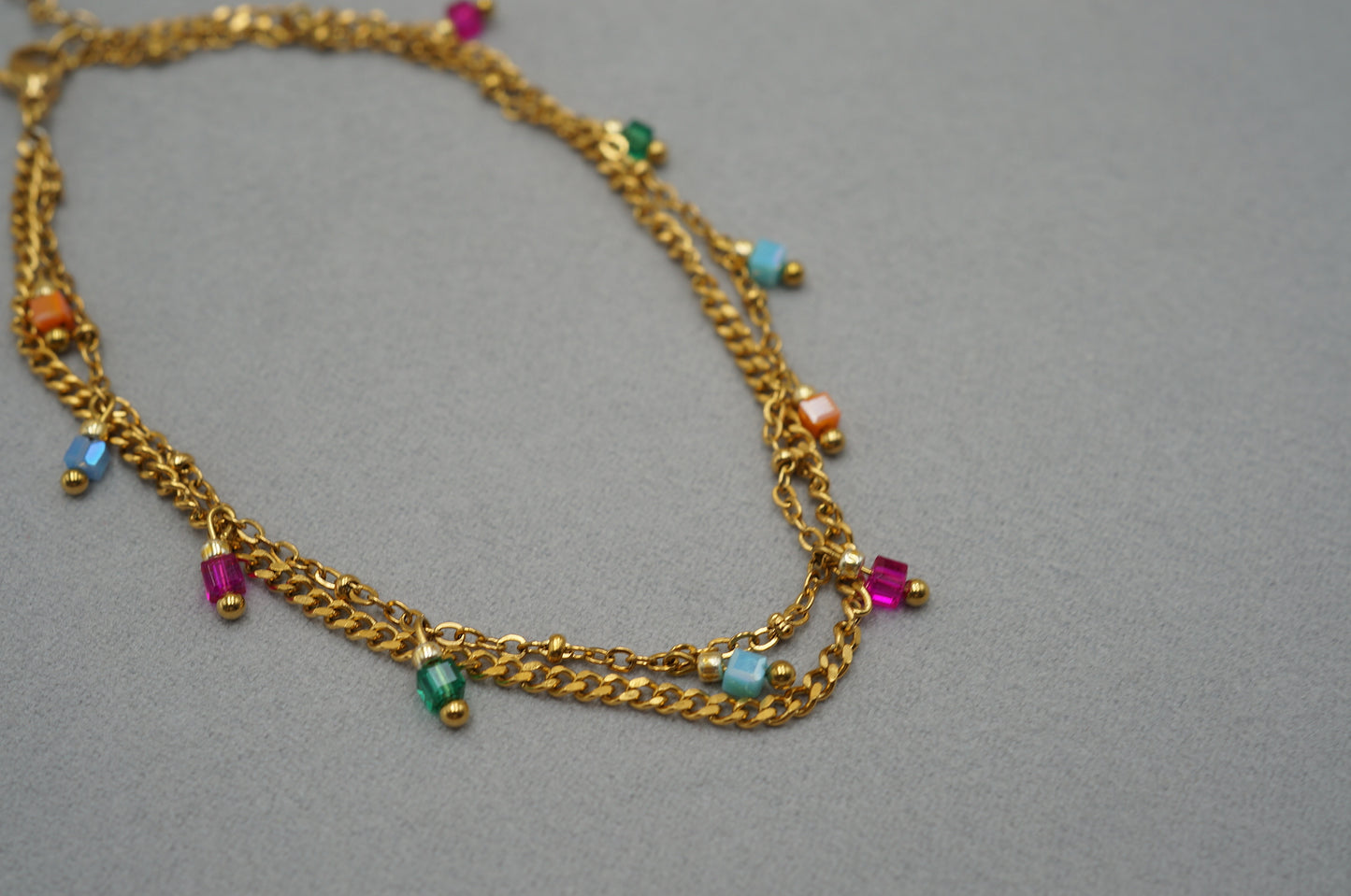 cavigliera a doppio filo con perline pendente