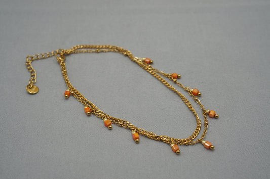 cavigliera a doppio filo con perline pendente