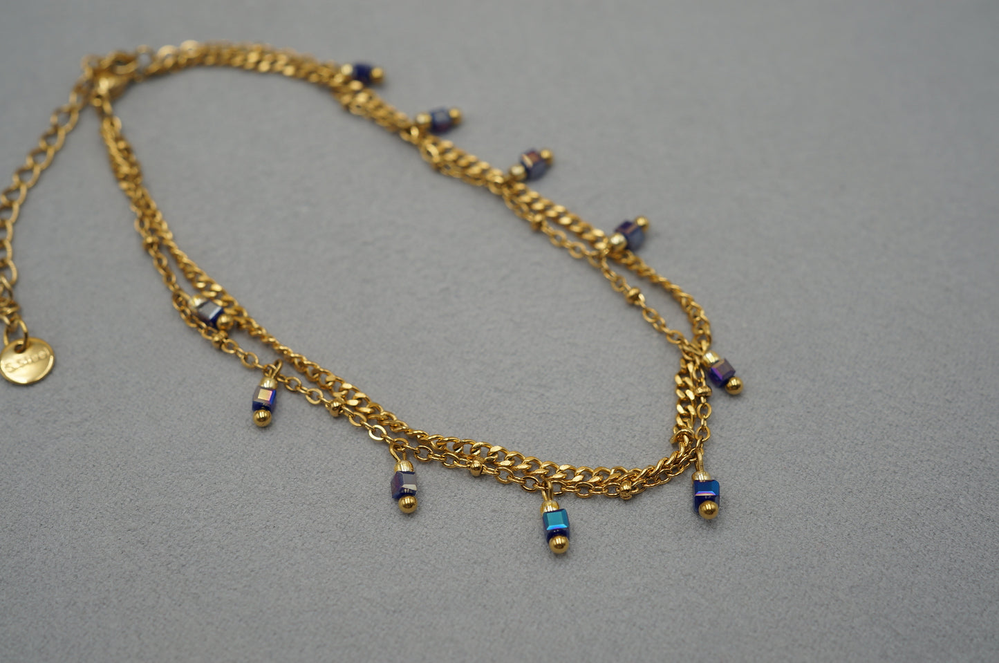 cavigliera a doppio filo con perline pendente