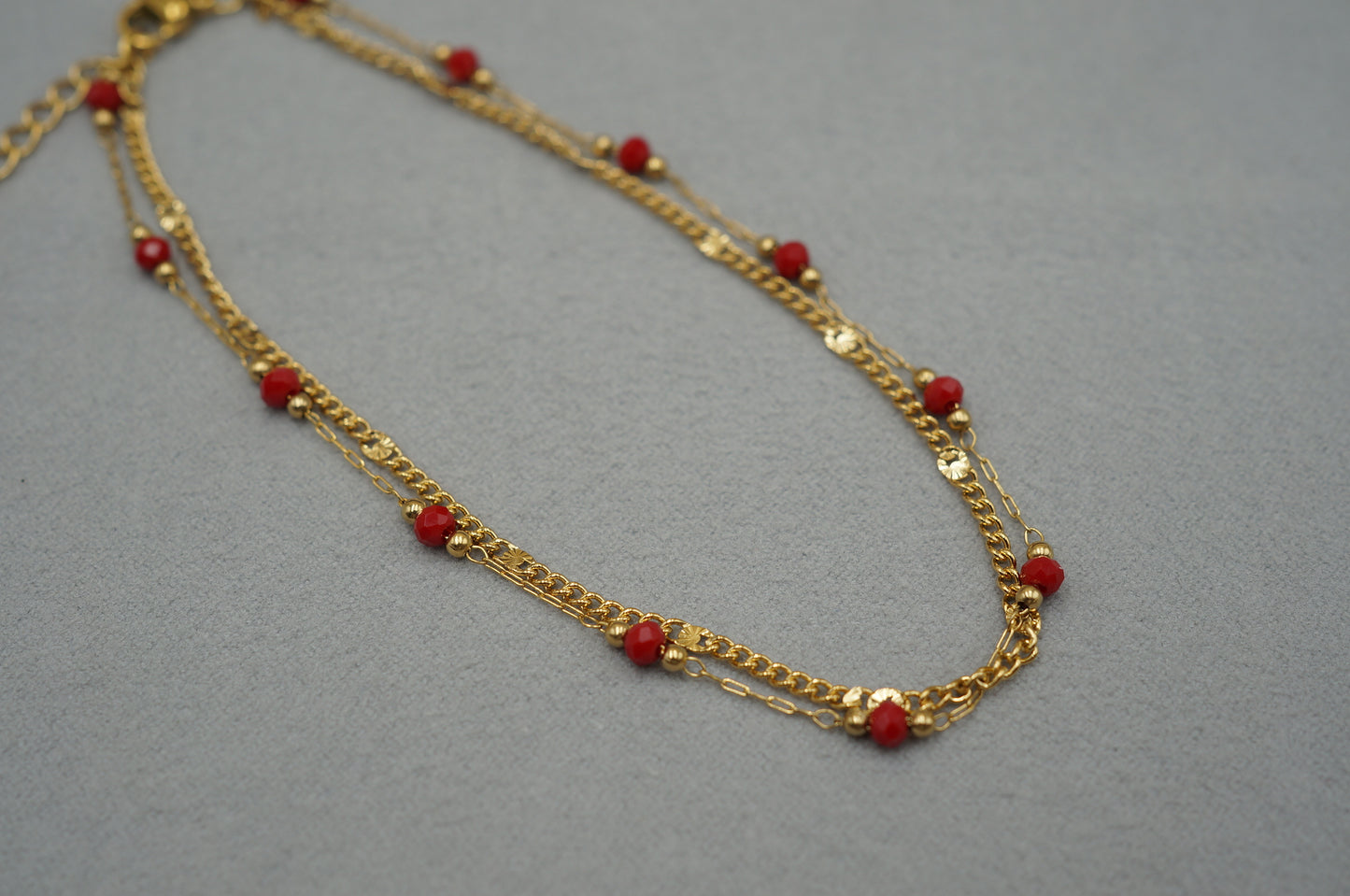 cavigliera a doppio filo con perline