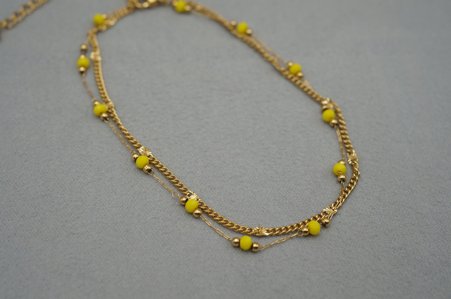 cavigliera a doppio filo con perline