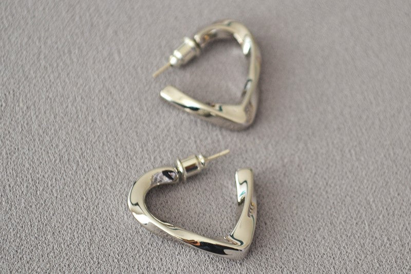 Orecchini cuore intrecciato