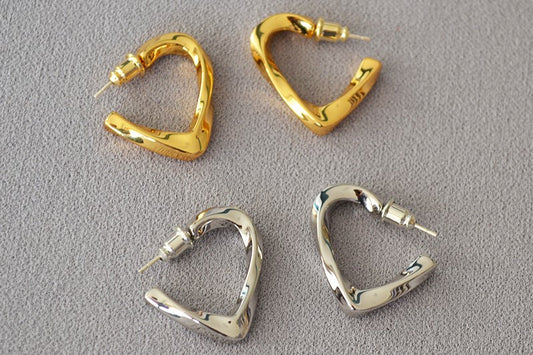 Orecchini cuore intrecciato