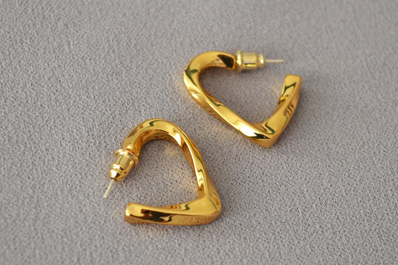 Orecchini cuore intrecciato