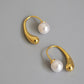 Drop earrings with pearl closure