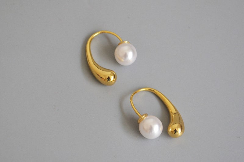 Drop earrings with pearl closure